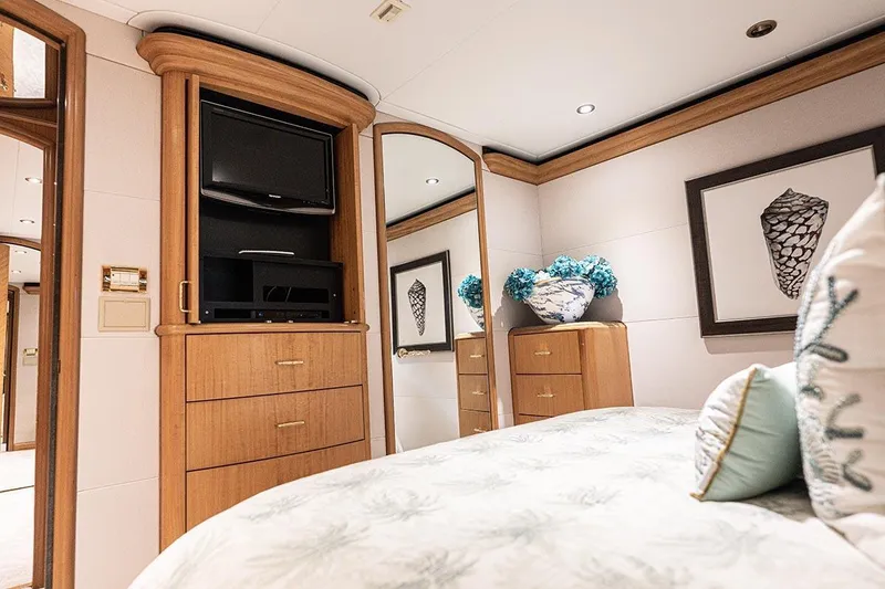 Slide: The Image of Luxurious Cheoy Lee Trideck 2003 yacht bedroom with elegant decor and modern amenities. - 19