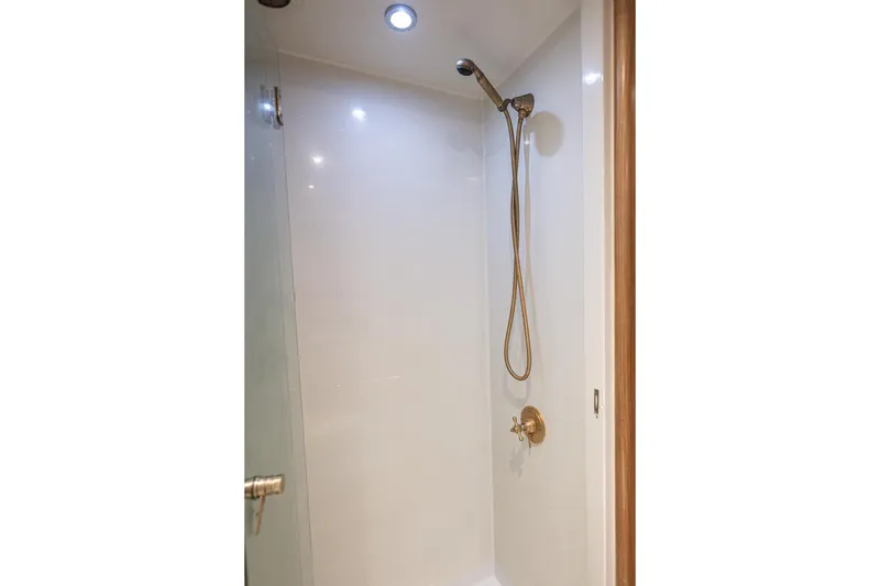 Slide: The Image of Shower area in 2003 Cheoy Lee Trideck yacht, featuring modern fixtures and lighting. - 21