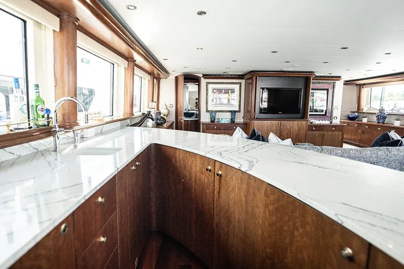 Slide: The Image of Luxurious interior of 2003 Cheoy Lee Trideck yacht with elegant marble countertops. - 25