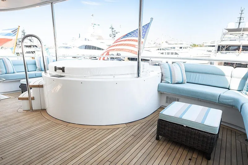 Slide: The Image of Luxurious 2003 Cheoy Lee Trideck yacht deck with jacuzzi and seating area. - 28