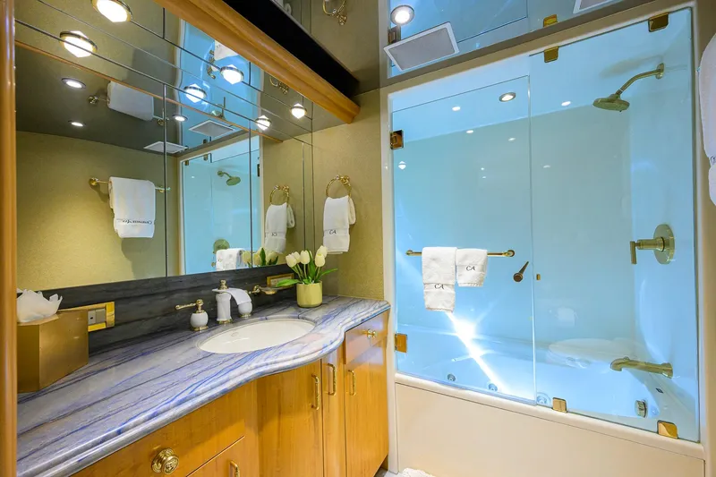 Slide: The Image of Luxurious bathroom on 2003 Cheoy Lee Trideck yacht with elegant fixtures and glass shower. - 38