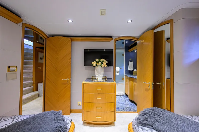 Slide: The Image of Luxurious 2003 Cheoy Lee Trideck yacht interior with elegant wood finishes and modern amenities. - 40