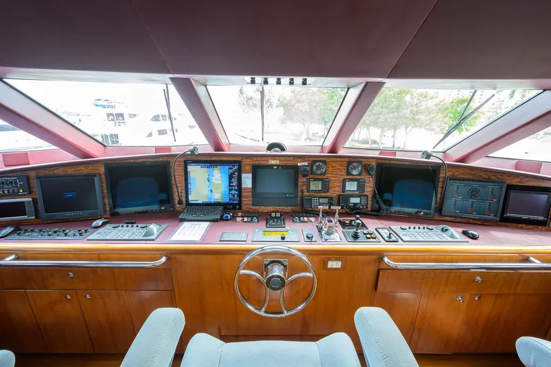 Slide: The Image of Bridge of 2003 Cheoy Lee Trideck yacht with navigation equipment and controls. - 44
