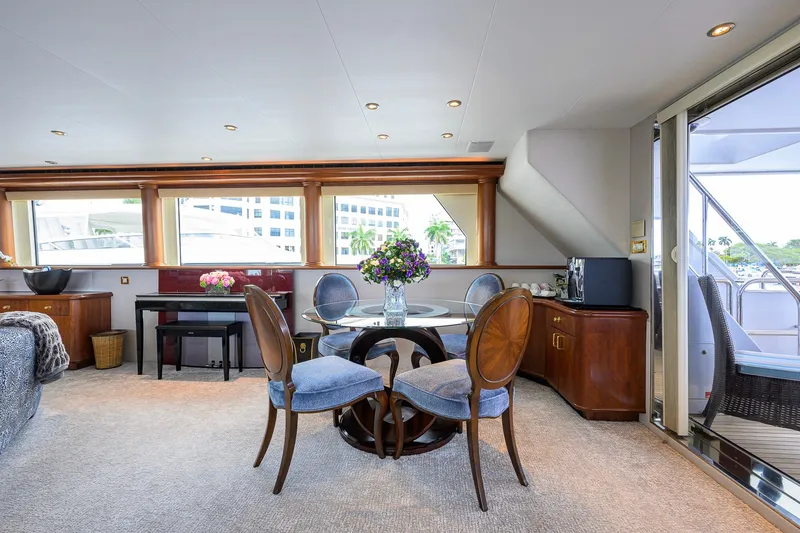 Slide: The Image of Luxurious interior of 2003 Cheoy Lee Trideck yacht with elegant dining area and large windows. - 50