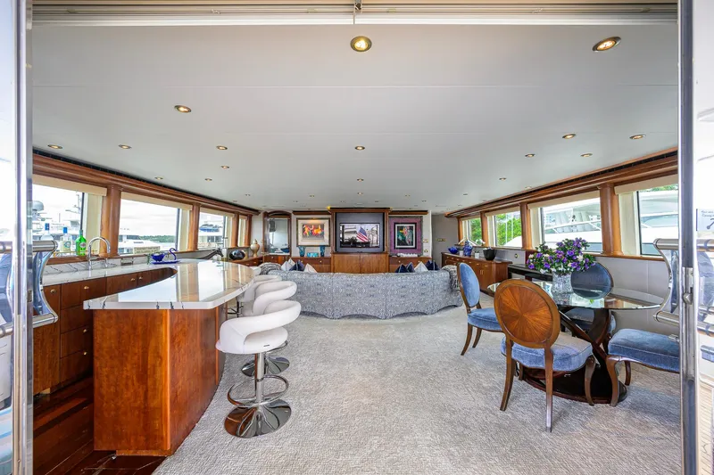 Slide: The Image of Luxurious interior of 2003 Cheoy Lee Trideck yacht with elegant seating and dining area. - 52
