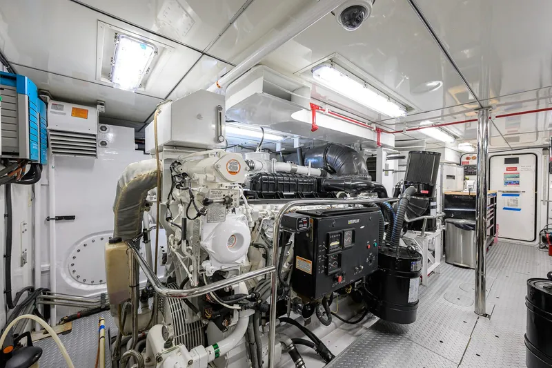 Slide: The Image of Engine room of 2003 Cheoy Lee Trideck yacht, featuring advanced machinery and equipment. - 72