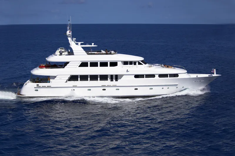 Slide: The Image of 2003 Cheoy Lee Trideck yacht cruising on open sea, showcasing elegant design and luxury. - 85