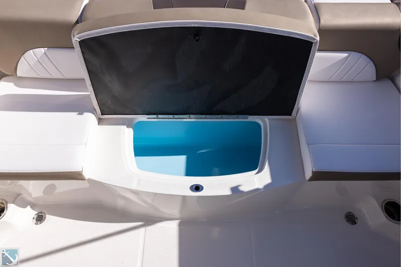 Slide: The Image of 2020 Chaparral 21 SSi OB boat dashboard with steering wheel and controls. - 6