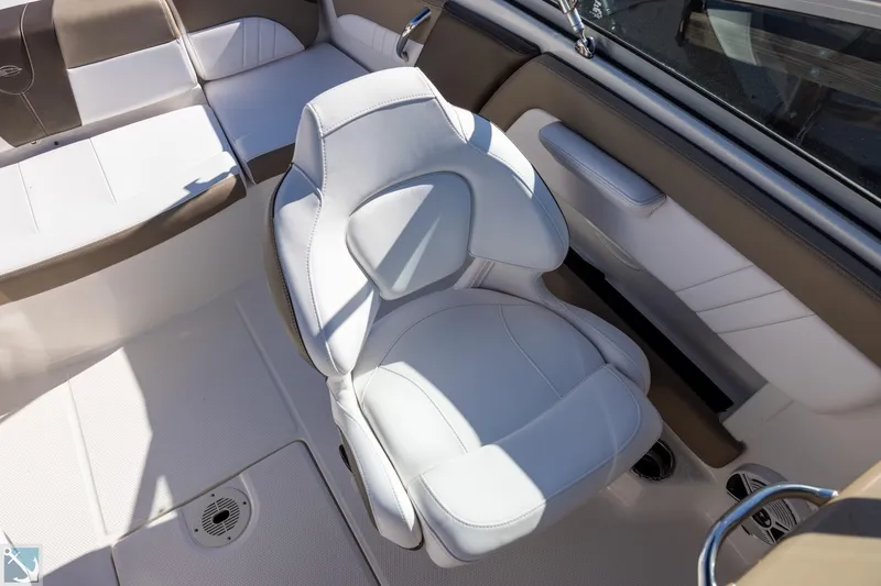 Slide: The Image of 2020 Chaparral 21 SSi OB boat interior with tan and white seating. - 9