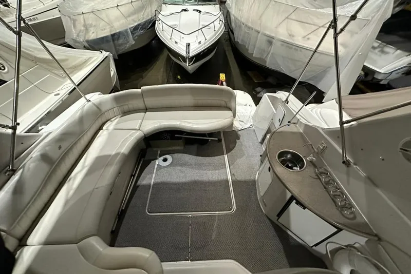 Slide: The Image of 2002 Four Winns 378 Vista boat interior with seating and kitchenette area. - 18