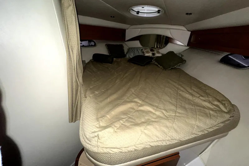 Slide: The Image of Cozy cabin interior of 2002 Four Winns 378 Vista yacht with bed and pillows. - 29