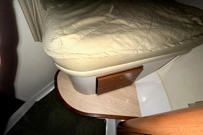 Slide: The Image of Interior cabin of 2002 Four Winns 378 Vista boat with bed and storage. - 30