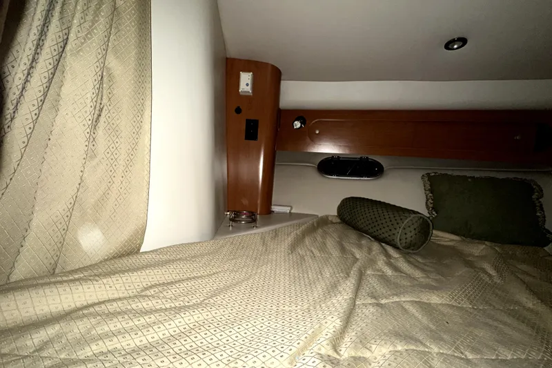 Slide: The Image of Cozy cabin interior of 2002 Four Winns 378 Vista yacht with elegant bedding. - 31