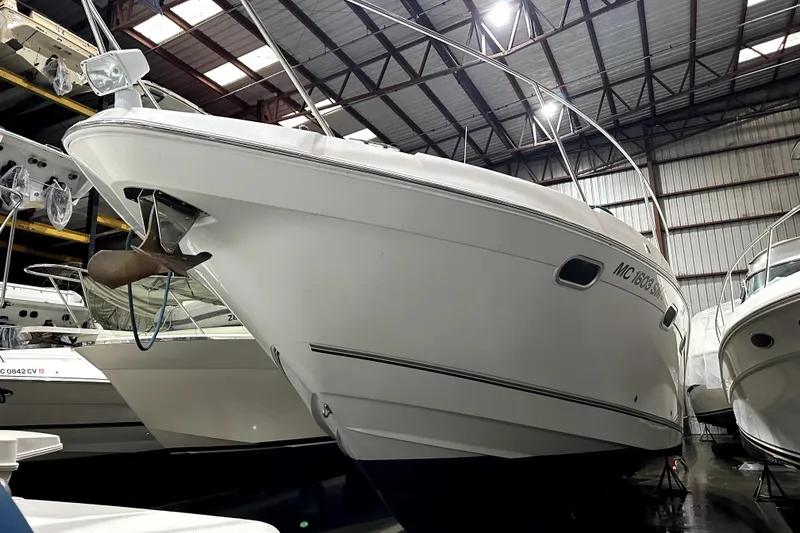 Slide: The Image of 2002 Four Winns 378 Vista boat in indoor storage facility. - 4