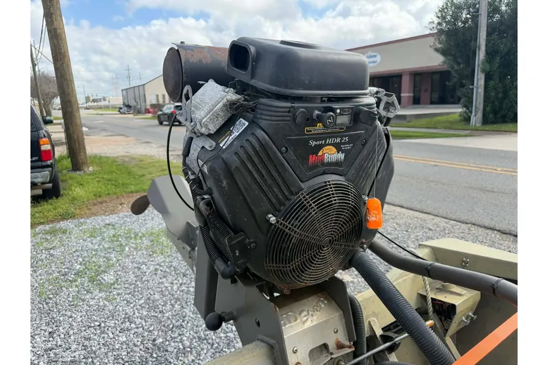 Slide: The Image of Outdoor motor labeled "Sport HDR 25" on a Custom BFC Marine 16, 2004 model. - 6