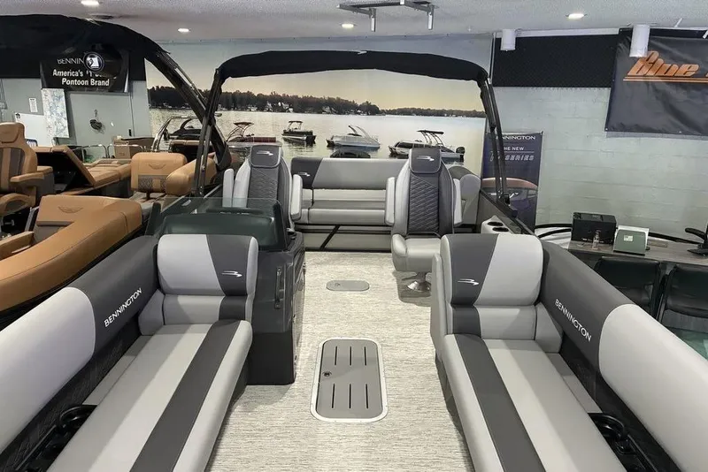 Slide: The Image of 2026 Bennington S Swingback 23 SSB pontoon boat interior with luxurious seating and modern design. - 6
