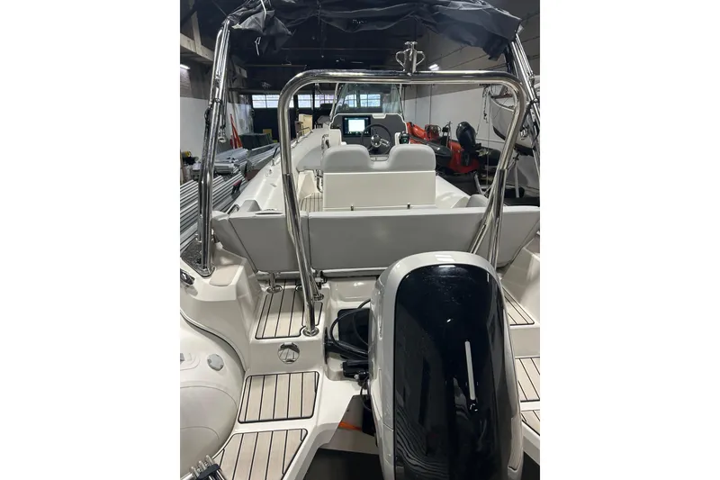 Slide: The Image of 2025 Zodiac Medline 6.8 boat interior with modern design and powerful engine. - 20