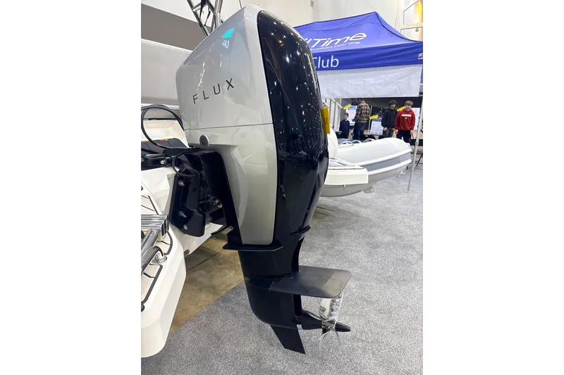 Slide: The Image of 2025 Zodiac Medline 6.8 boat with Flux outboard motor at a marine exhibition. - 22