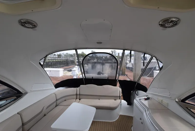 Slide: The Image of 2011 Formula 400ss yacht interior with seating and table. - 11