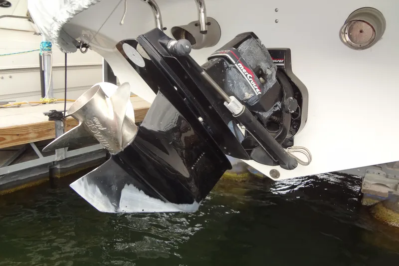 Slide: The Image of 1998 Wellcraft 26 Scarab boat with MerCruiser outdrive and stainless steel propeller. - 31