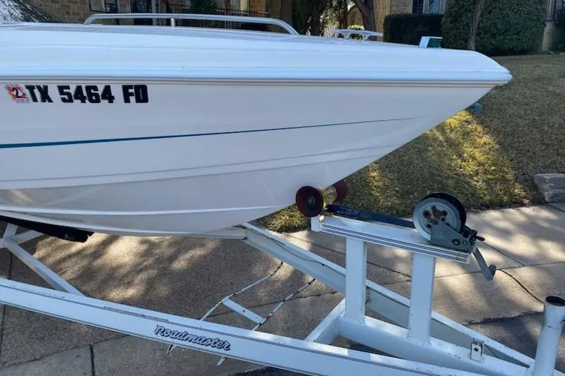 Slide: The Image of 1998 Wellcraft 26 Scarab boat on trailer, registration TX 5464 FD. - 36