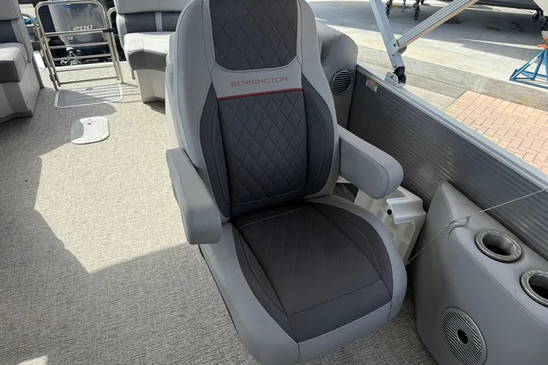Slide: The Image of 2022 Bennington 25 LFB boat seat with diamond stitching and armrests. - 17