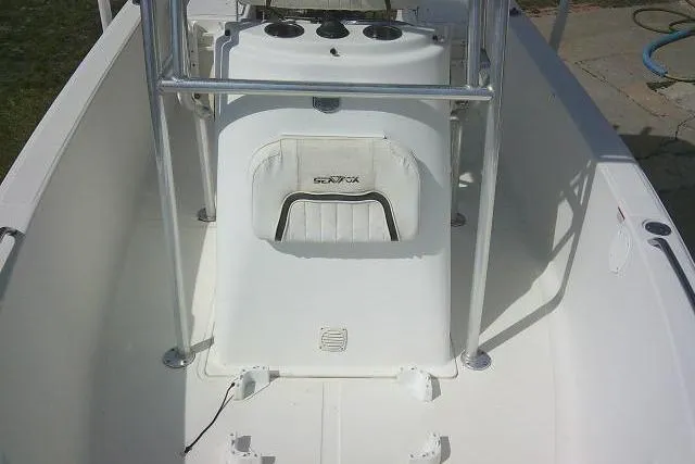 Slide: The Image of 2010 Sea Fox 187 Center Console boat interior with steering console and seating. - 11