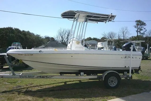 Slide: The Image of 2010 Sea Fox 187 Center Console boat on trailer, parked outdoors. - 17
