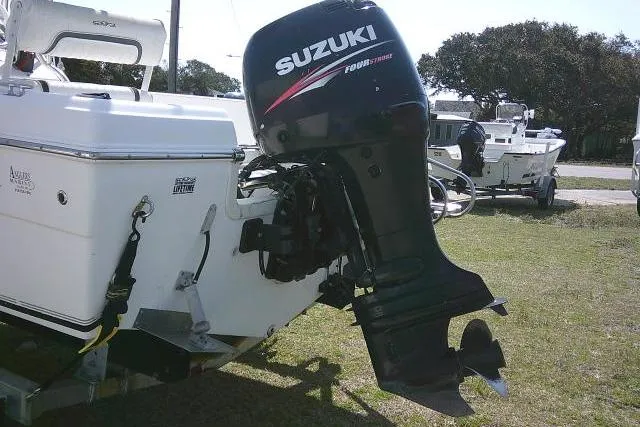 Slide: The Image of 2010 Sea Fox 187 Center Console with Suzuki outboard motor on grass. - 20