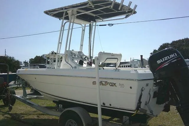 Slide: The Image of 2010 Sea Fox 187 Center Console boat with Suzuki outboard motor on trailer. - 3