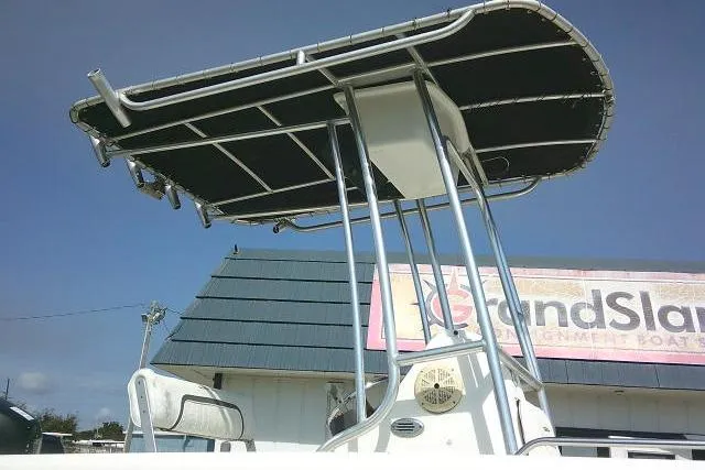 Slide: The Image of 2010 Sea Fox 187 Center Console boat with T-top, outdoor setting. - 9