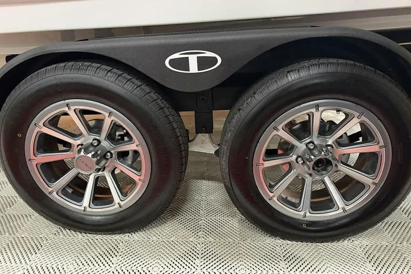 Slide: The Image of 2026 Tahoe 2150 trailer wheels with stylish alloy rims on a textured surface. - 14