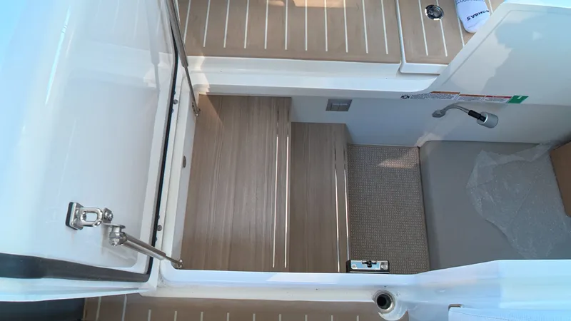 Slide: The Image of The 2027 Saxdor 400 GTC features a modern cabin with wood and carpet flooring. - 10
