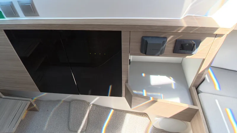Slide: The Image of Interior of a Saxdor 400 GTC with wood paneling and modern cabinetry. - 29