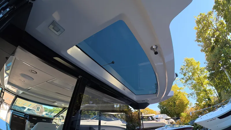 Slide: The Image of The image shows the roof of a Saxdor 400 GTC with a large glass window. - 46