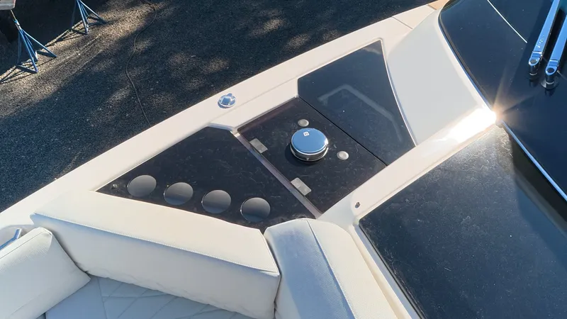 Slide: The Image of The image shows the deck of a 2027 Saxdor 400 GTC with sleek upholstery and controls. - 48