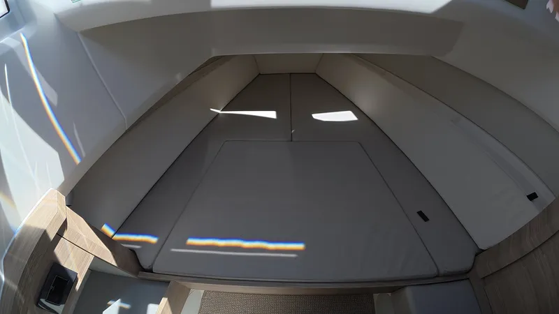 Slide: The Image of Interior of the Saxdor 400 GTC featuring a cushioned lounging area. - 31