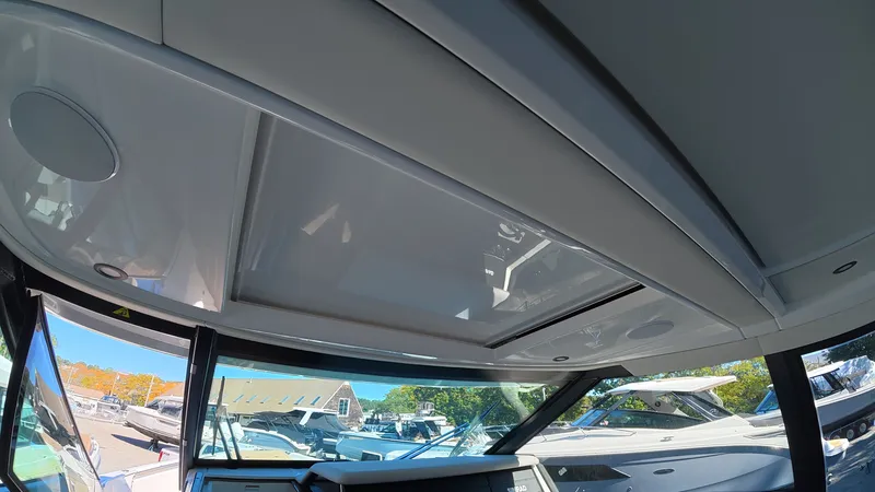 Slide: The Image of Interior view of a modern boat with large windows and sleek roof design. - 45