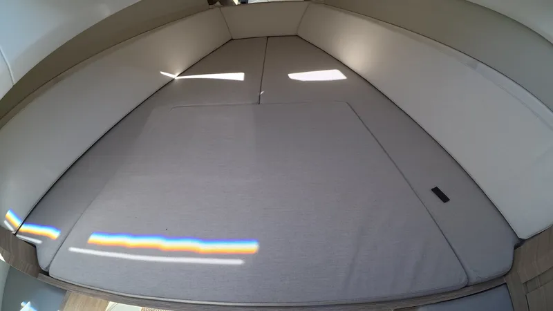 Slide: The Image of Interior of the Saxdor 400 GTC with gray upholstery and white walls. - 32