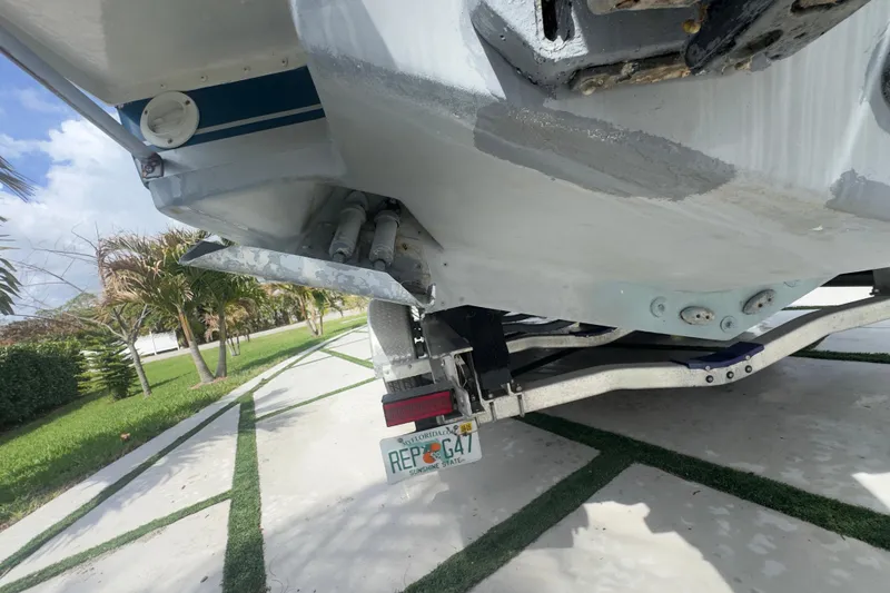 Slide: The Image of 2007 Intrepid 370 Center Console boat on trailer, Florida license plate visible. - 18