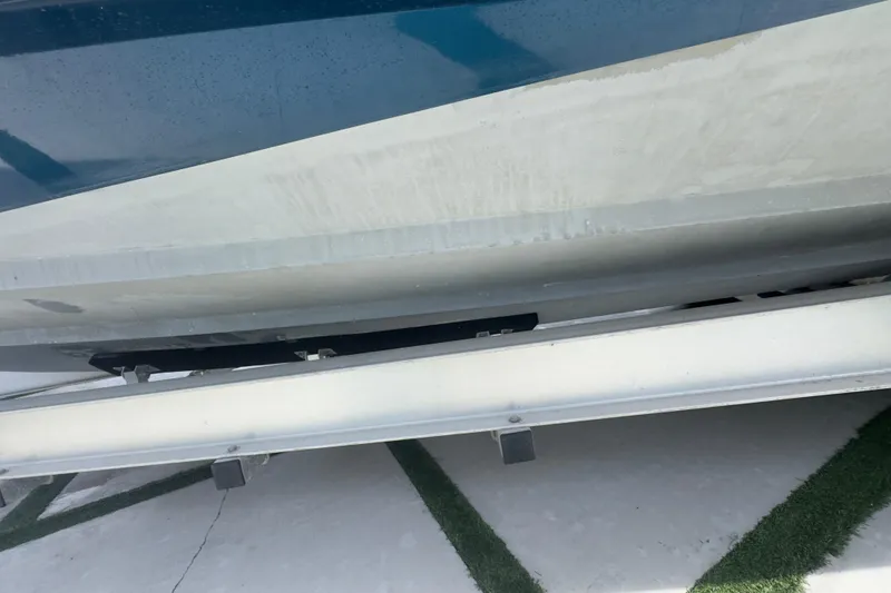 Slide: The Image of 2007 Intrepid 370 Center Console boat hull on trailer, close-up view. - 29