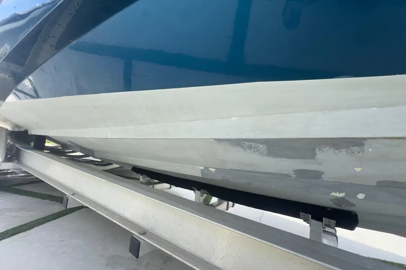 Slide: The Image of 2007 Intrepid 370 Center Console boat hull on trailer, showing underside details. - 8