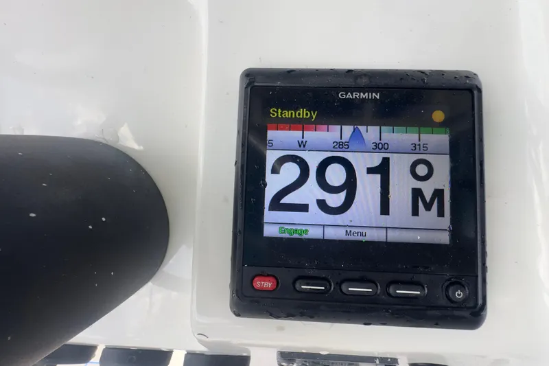 Slide: The Image of Garmin navigation display on 2007 Intrepid 370 Center Console showing heading 291 degrees. - 83