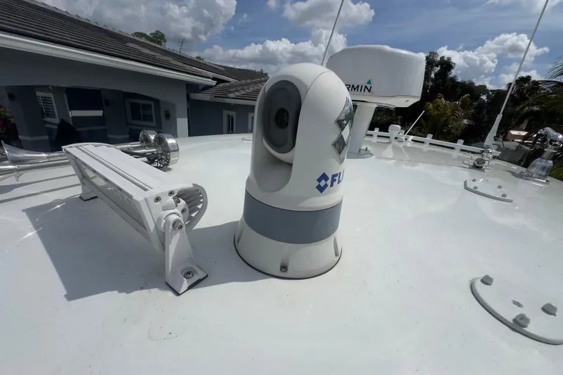 Slide: The Image of FLIR camera and Garmin radar on 2007 Intrepid 370 Center Console boat deck. - 91