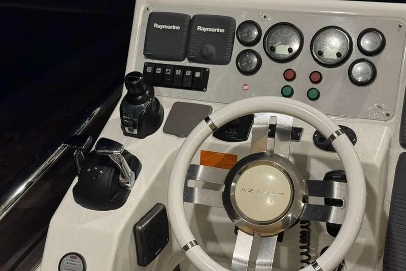 Slide: The Image of Luxurious 2014 Azimut 64 yacht interior with elegant seating and ambient lighting. - 13