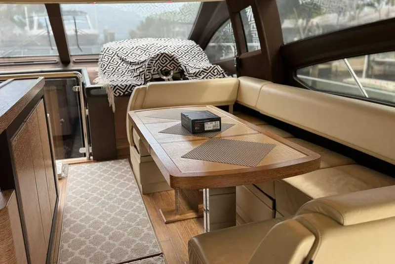 Slide: The Image of Luxurious interior of a 2014 Azimut 64 yacht featuring a modern kitchen area. - 17