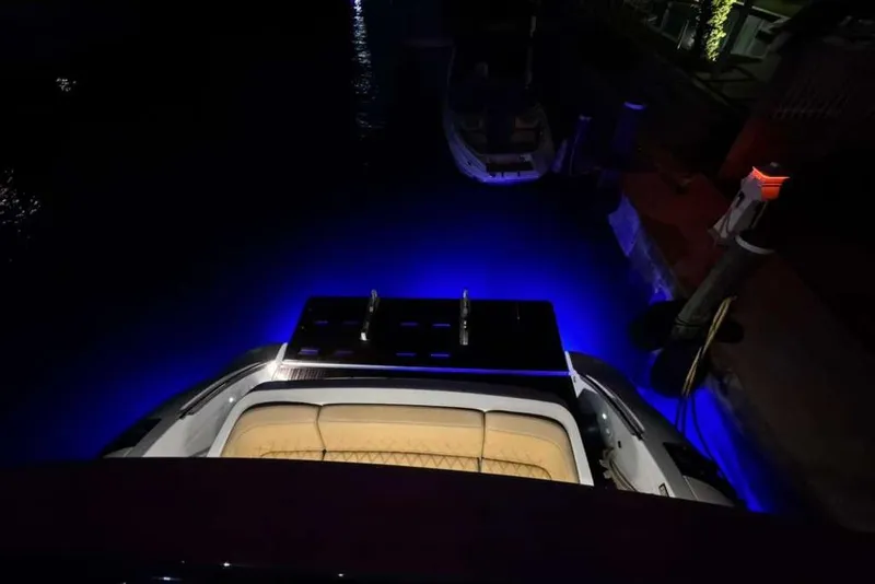 Slide: The Image of Luxurious interior of a 2014 Azimut 64 yacht featuring a cozy bedroom and modern amenities. - 2