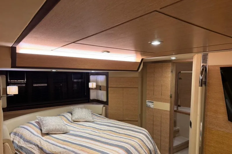 Slide: The Image of Luxurious bathroom sink in 2014 Azimut 64 yacht with porthole view. - 23