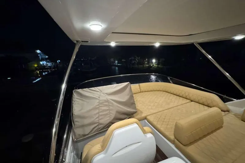 Slide: The Image of Captain's seat and steering wheel on 2014 Azimut 64 yacht deck. - 9