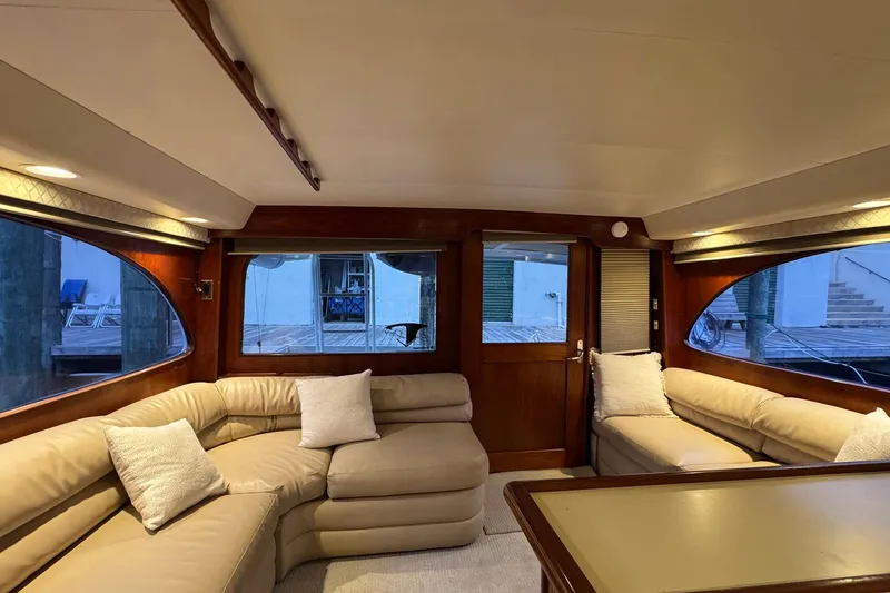 Slide: The Image of Luxurious interior of 1988 Buddy Davis 47 Convertible yacht with plush seating and elegant design. - 16